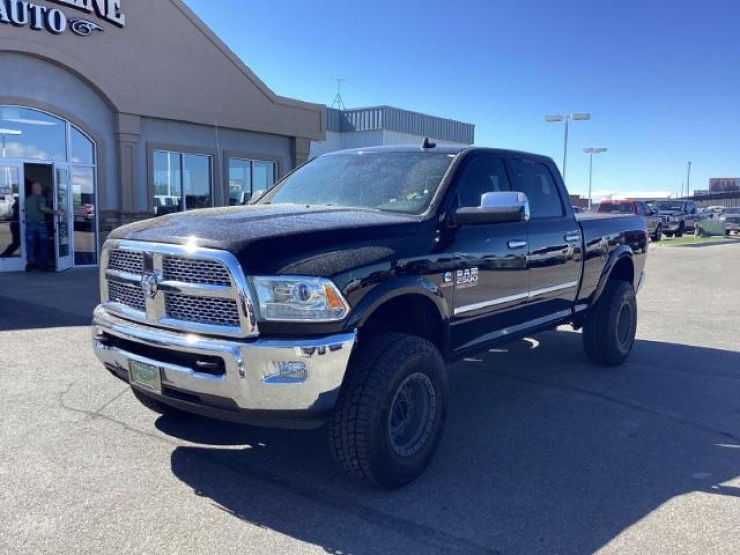 2014 Black Clearcoat /Black RAM 2500 Laramie Crew Cab SWB 4WD (3C6UR5FLXEG) with an 6.7L L6 OHV 24V TURBO DIESEL engine, 6-Speed Automatic transmission, located at 1235 N Woodruff Ave., Idaho Falls, 83401, (208) 523-1053, 43.507172, -112.000488 - Photo#0