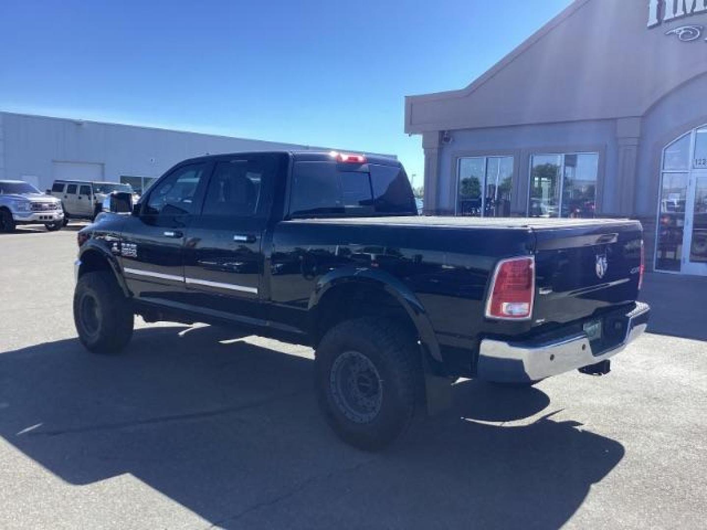 2014 Black Clearcoat /Black RAM 2500 Laramie Crew Cab SWB 4WD (3C6UR5FLXEG) with an 6.7L L6 OHV 24V TURBO DIESEL engine, 6-Speed Automatic transmission, located at 1235 N Woodruff Ave., Idaho Falls, 83401, (208) 523-1053, 43.507172, -112.000488 - Photo#2