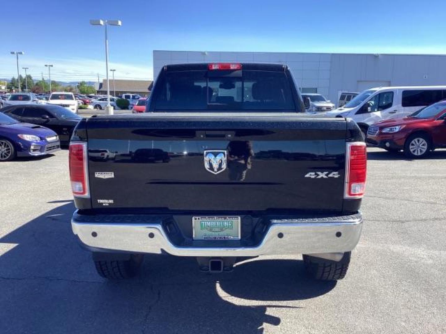 2014 Black Clearcoat /Black RAM 2500 Laramie Crew Cab SWB 4WD (3C6UR5FLXEG) with an 6.7L L6 OHV 24V TURBO DIESEL engine, 6-Speed Automatic transmission, located at 1235 N Woodruff Ave., Idaho Falls, 83401, (208) 523-1053, 43.507172, -112.000488 - Photo#3