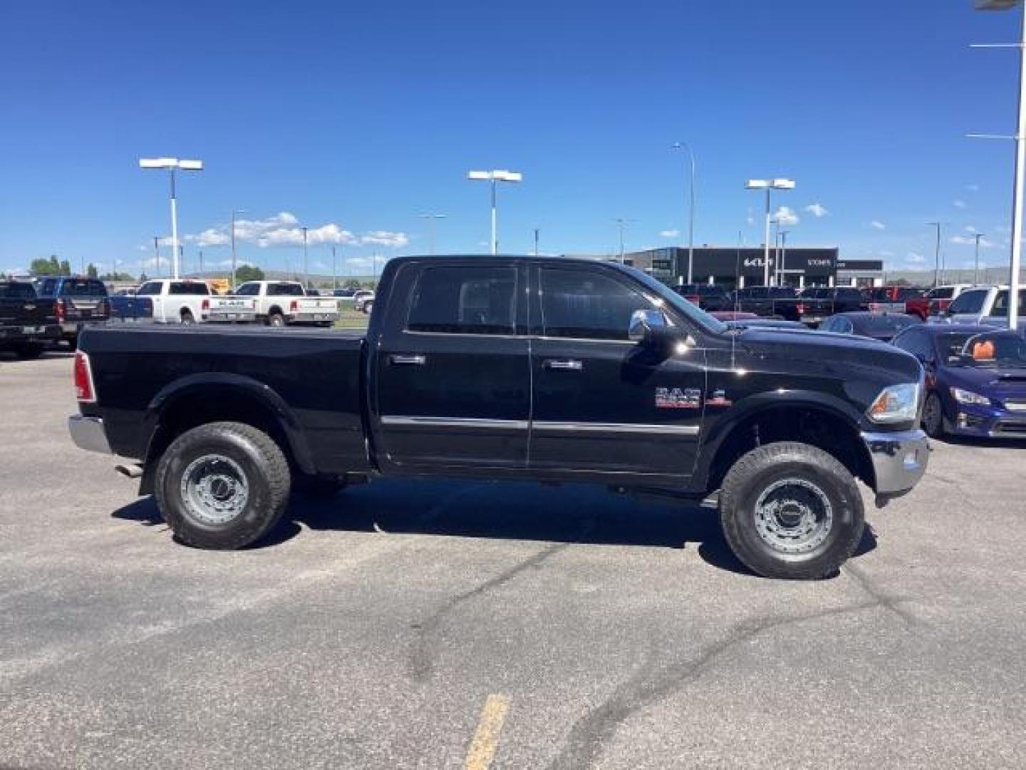 2014 Black Clearcoat /Black RAM 2500 Laramie Crew Cab SWB 4WD (3C6UR5FLXEG) with an 6.7L L6 OHV 24V TURBO DIESEL engine, 6-Speed Automatic transmission, located at 1235 N Woodruff Ave., Idaho Falls, 83401, (208) 523-1053, 43.507172, -112.000488 - Photo#5