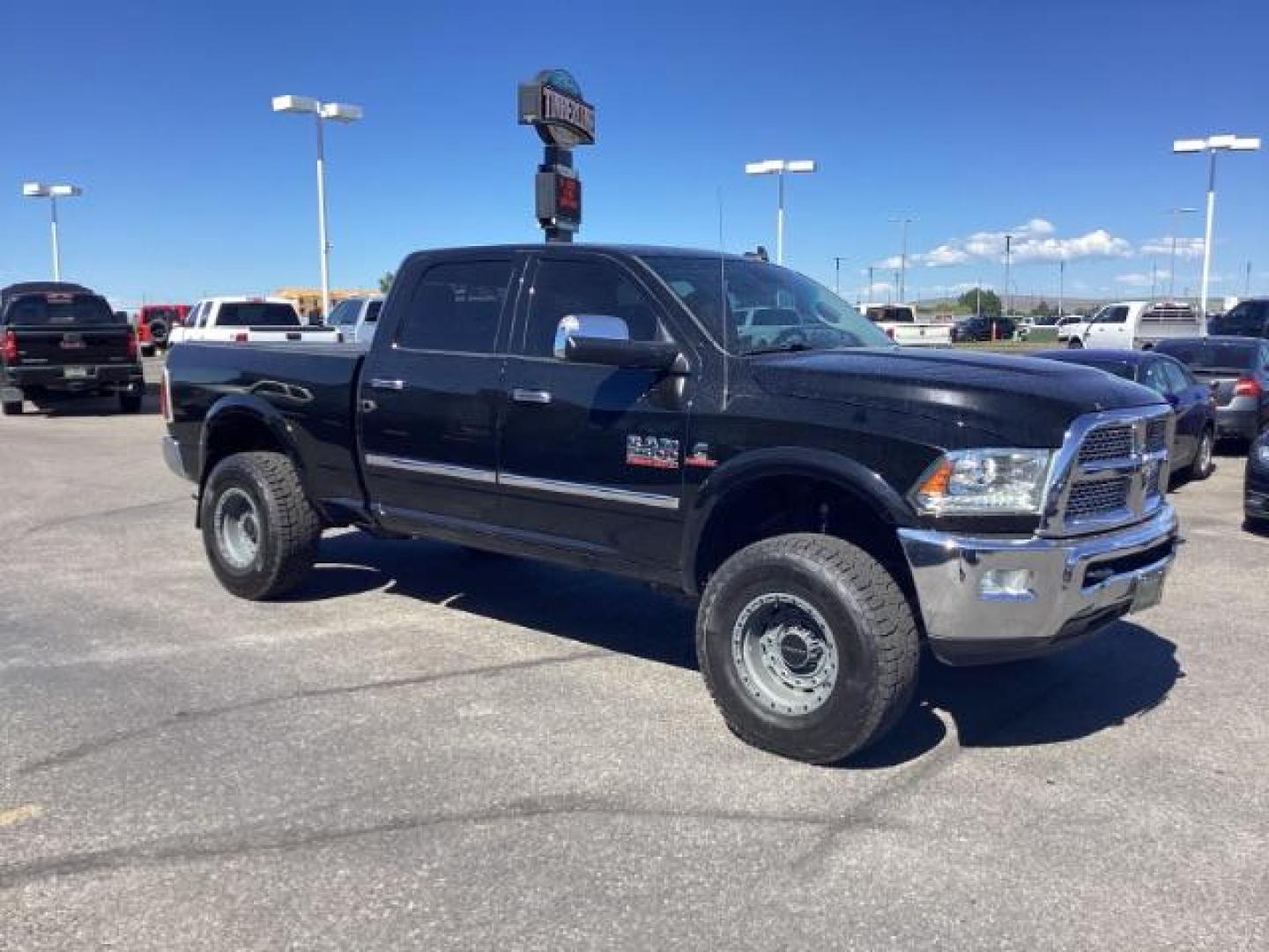 2014 Black Clearcoat /Black RAM 2500 Laramie Crew Cab SWB 4WD (3C6UR5FLXEG) with an 6.7L L6 OHV 24V TURBO DIESEL engine, 6-Speed Automatic transmission, located at 1235 N Woodruff Ave., Idaho Falls, 83401, (208) 523-1053, 43.507172, -112.000488 - Photo#6