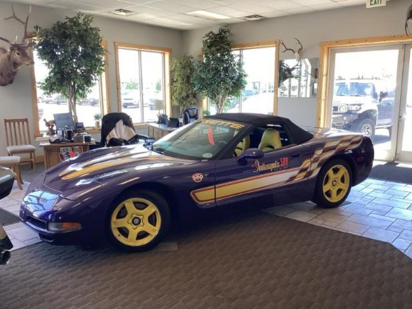 1998 Medium Purple Pearl Metallic with Black Top /YELLOW LEATHER Chevrolet Corvette Convertible (1G1YY32G6W5) with an 5.7L V8 OHV 16V engine, 6-Speed Manual transmission, located at 1235 N Woodruff Ave., Idaho Falls, 83401, (208) 523-1053, 43.507172, -112.000488 - Photo#0