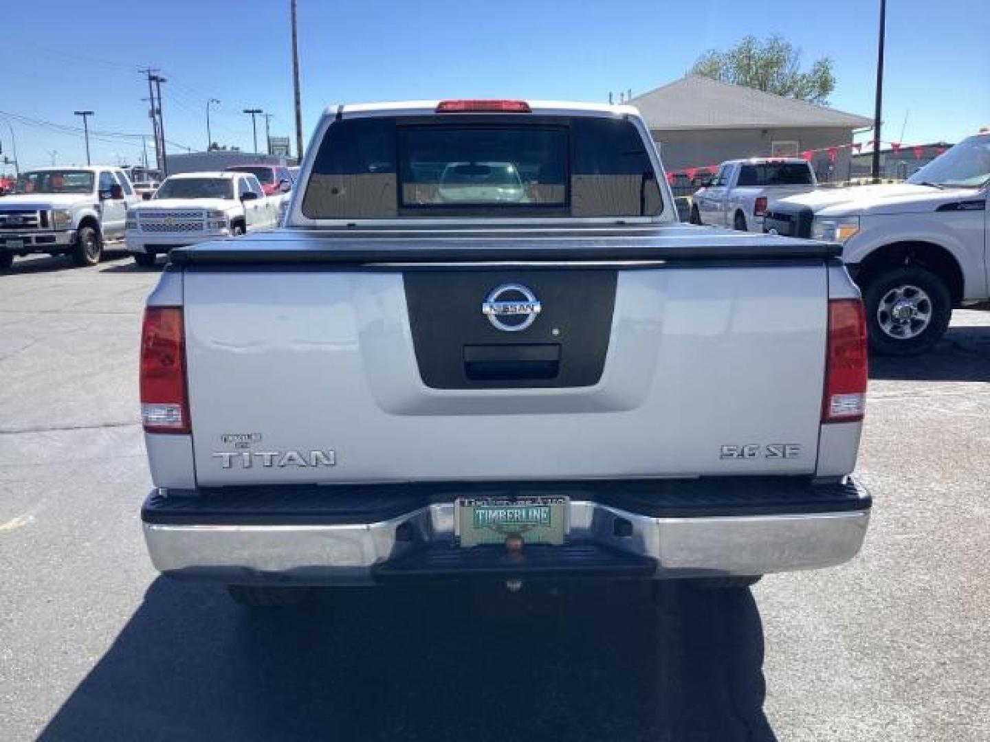 2009 Nissan Titan SE Crew Cab 4WD SWB (1N6AA07C29N) with an 5.6L V8 DOHC 32V engine, 5-Speed Automatic transmission, located at 1235 N Woodruff Ave., Idaho Falls, 83401, (208) 523-1053, 43.507172, -112.000488 - Photo#3