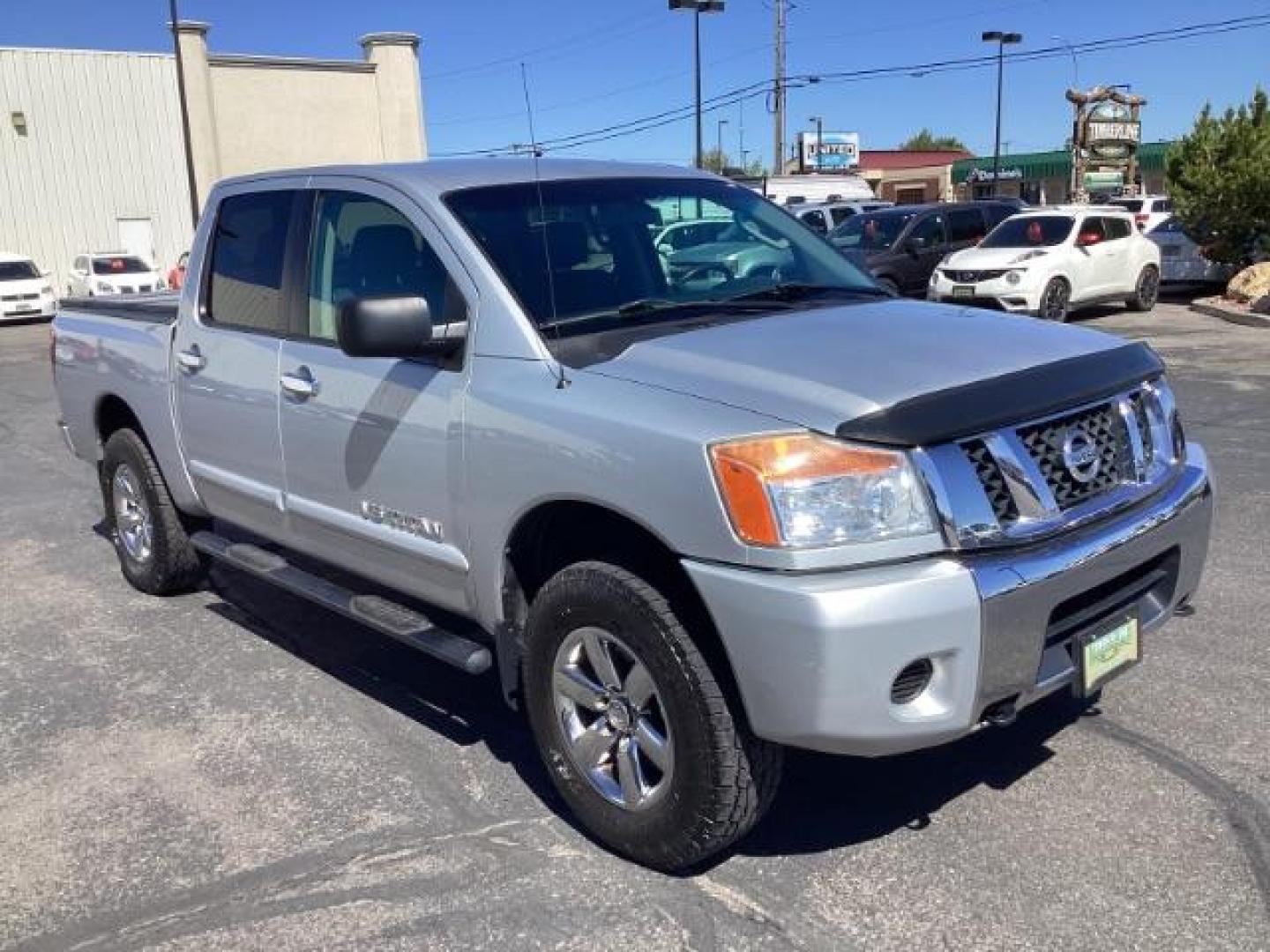 2009 Nissan Titan SE Crew Cab 4WD SWB (1N6AA07C29N) with an 5.6L V8 DOHC 32V engine, 5-Speed Automatic transmission, located at 1235 N Woodruff Ave., Idaho Falls, 83401, (208) 523-1053, 43.507172, -112.000488 - Photo#5