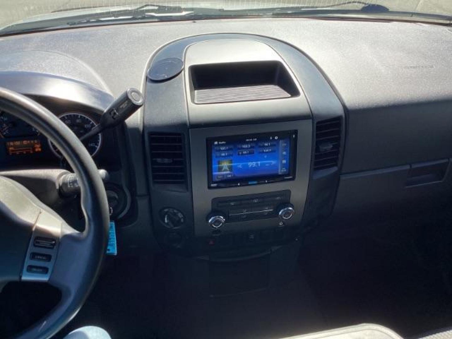 2009 Nissan Titan SE Crew Cab 4WD SWB (1N6AA07C29N) with an 5.6L V8 DOHC 32V engine, 5-Speed Automatic transmission, located at 1235 N Woodruff Ave., Idaho Falls, 83401, (208) 523-1053, 43.507172, -112.000488 - Photo#8