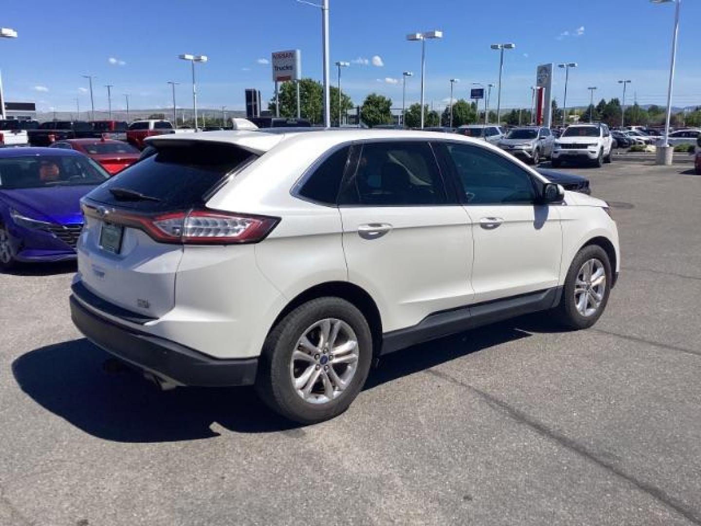 2015 CREAM /LEATHER Ford Edge SEL AWD (2FMTK4J99FB) with an 2.0L L4 DOHC 16V engine, 6-Speed Automatic transmission, located at 1235 N Woodruff Ave., Idaho Falls, 83401, (208) 523-1053, 43.507172, -112.000488 - Photo#4