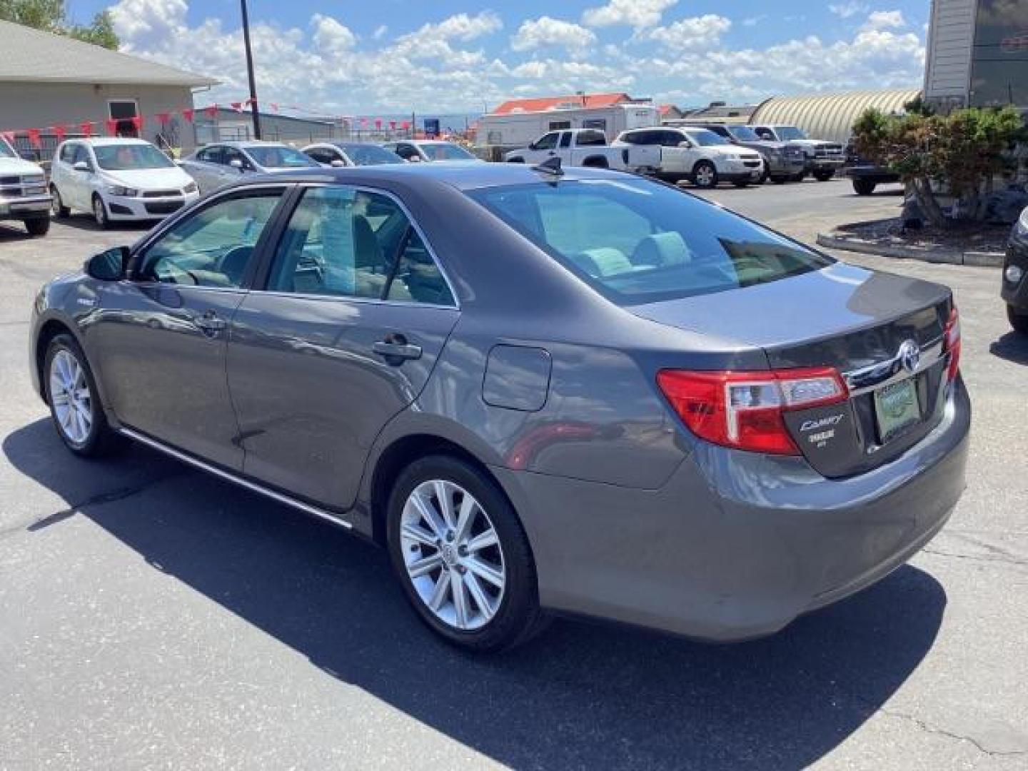 2013 GRAY /Light Gray Toyota Camry Hybrid XLE (4T1BD1FK0DU) with an 2.5L L4 DOHC 16V HYBRID engine, Continuously Variable Transmission transmission, located at 1235 N Woodruff Ave., Idaho Falls, 83401, (208) 523-1053, 43.507172, -112.000488 - Photo#1