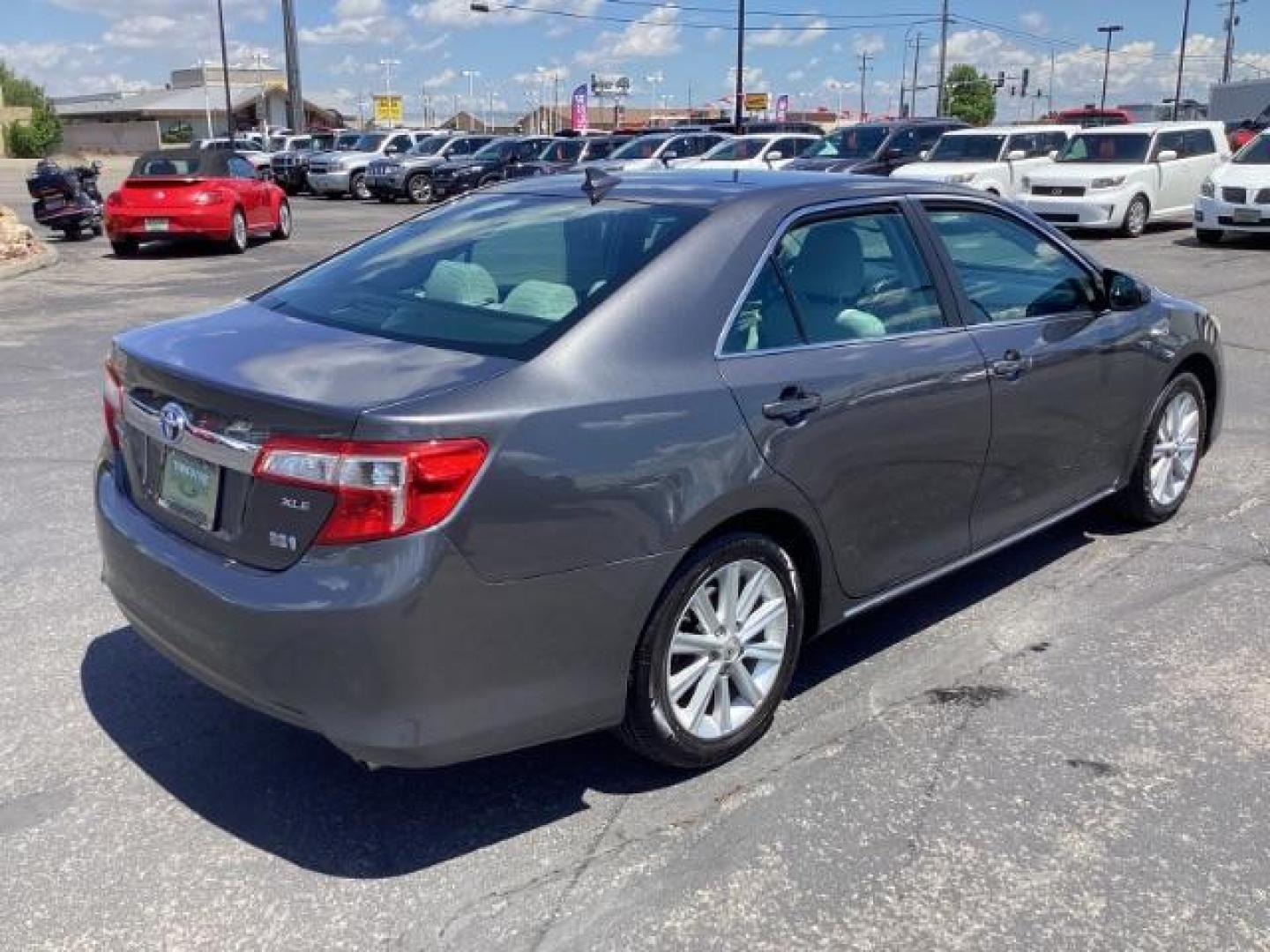 2013 GRAY /Light Gray Toyota Camry Hybrid XLE (4T1BD1FK0DU) with an 2.5L L4 DOHC 16V HYBRID engine, Continuously Variable Transmission transmission, located at 1235 N Woodruff Ave., Idaho Falls, 83401, (208) 523-1053, 43.507172, -112.000488 - Photo#3