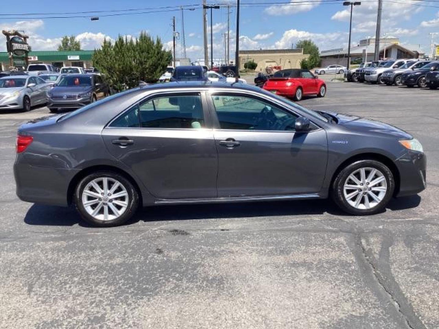 2013 GRAY /Light Gray Toyota Camry Hybrid XLE (4T1BD1FK0DU) with an 2.5L L4 DOHC 16V HYBRID engine, Continuously Variable Transmission transmission, located at 1235 N Woodruff Ave., Idaho Falls, 83401, (208) 523-1053, 43.507172, -112.000488 - Photo#4