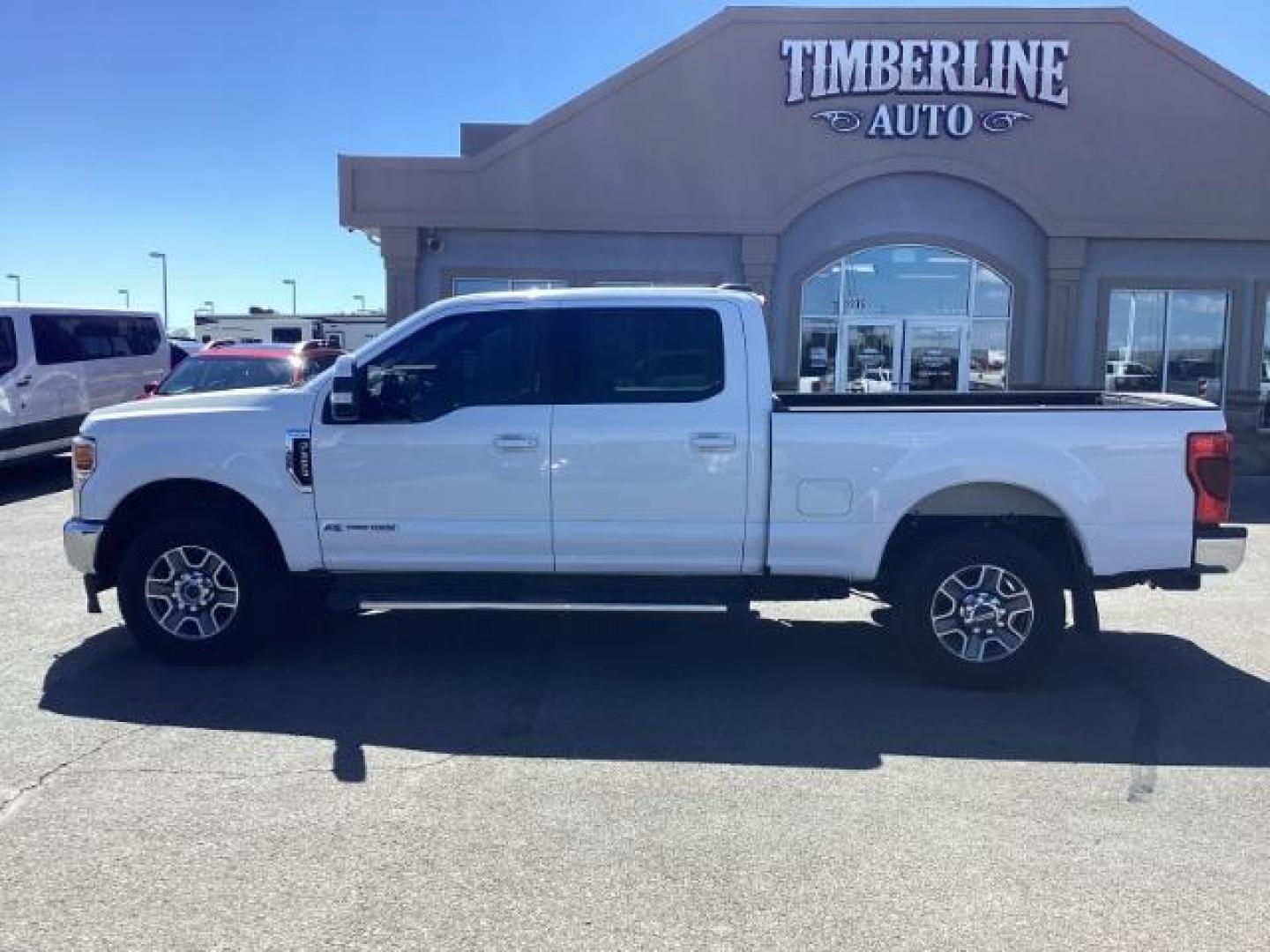 2020 WHITE /Black, leather Ford F-350 SD Lariat Crew Cab Long Bed 4WD (1FT8W3BT7LE) with an 6.7L V8 OHV 16V DIESEL engine, 6-Speed Automatic transmission, located at 1235 N Woodruff Ave., Idaho Falls, 83401, (208) 523-1053, 43.507172, -112.000488 - Photo#1