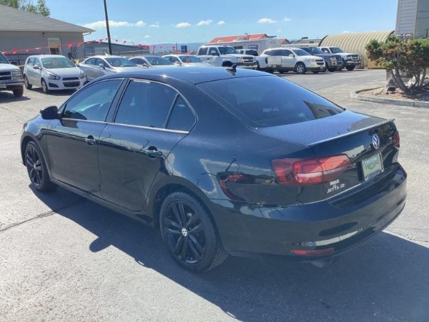 2018 Black /Titan Black w/Black Headliner, leatherette Volkswagen Jetta Sport 6A (3VWD17AJ7JM) with an 1.8L L4 DOHC 16V engine, 6-Speed Automatic transmission, located at 1235 N Woodruff Ave., Idaho Falls, 83401, (208) 523-1053, 43.507172, -112.000488 - Photo#2