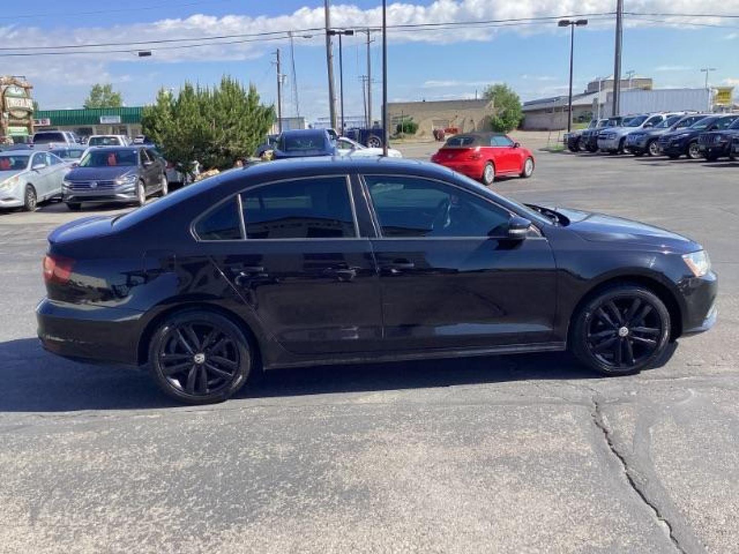 2018 Black /Titan Black w/Black Headliner, leatherette Volkswagen Jetta Sport 6A (3VWD17AJ7JM) with an 1.8L L4 DOHC 16V engine, 6-Speed Automatic transmission, located at 1235 N Woodruff Ave., Idaho Falls, 83401, (208) 523-1053, 43.507172, -112.000488 - Photo#5